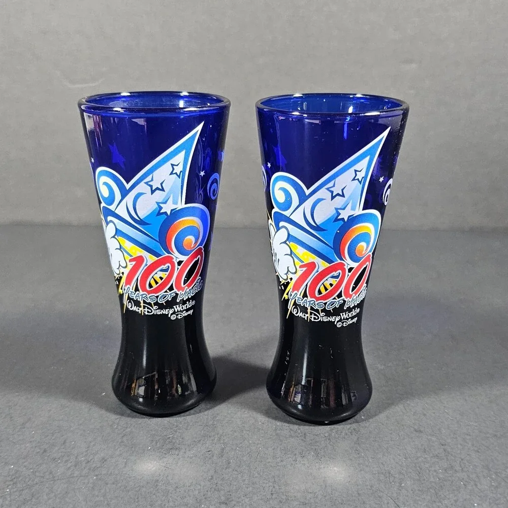 Vtg Set of 2 Walt Disney World 100 Years of Magic Cobalt Blue Shot Glasses 2001